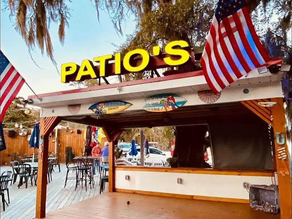Patio's Tiki Bar & Grill outdoor deck and sign