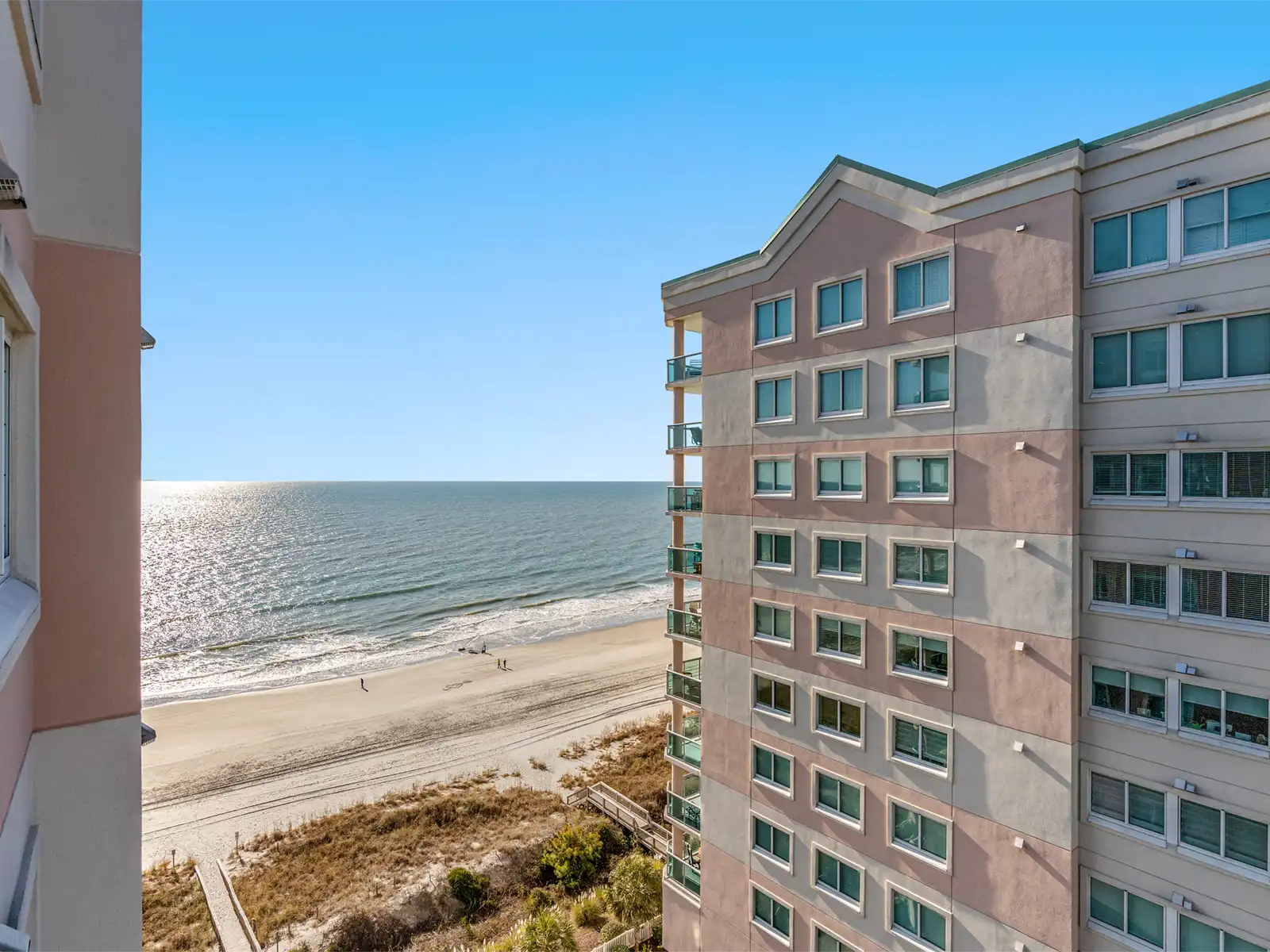 Elevated ocean-view retreat just steps from the sandy beach